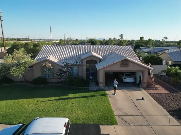ImageRoof crew completing a residential roof installation